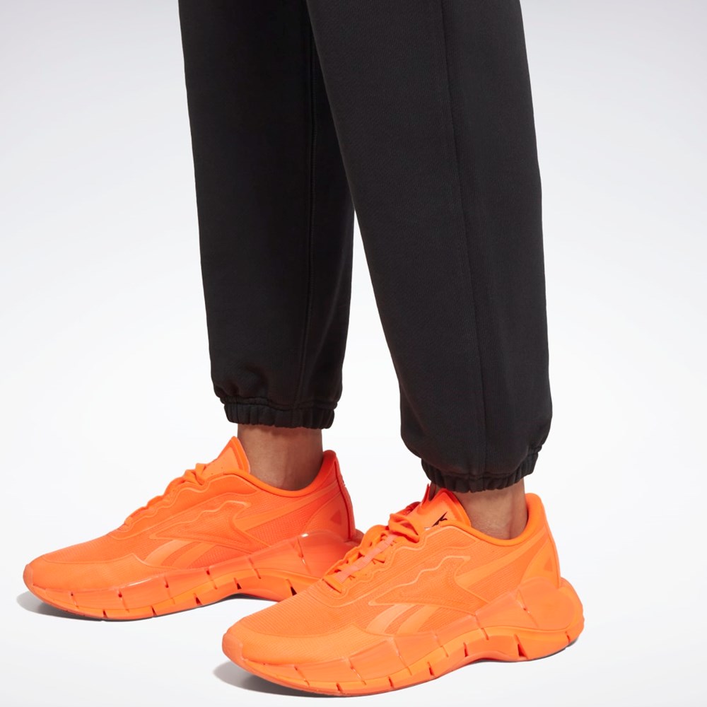 Black / Ultima Orange Reebok Victoria Beckham Straight Leg Joggers | HG7333