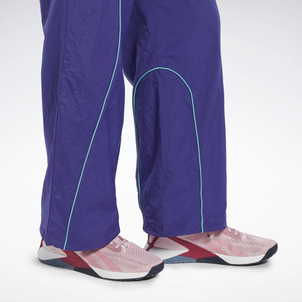 Bold Purple Reebok Les Mills® Woven Pants | HN6050