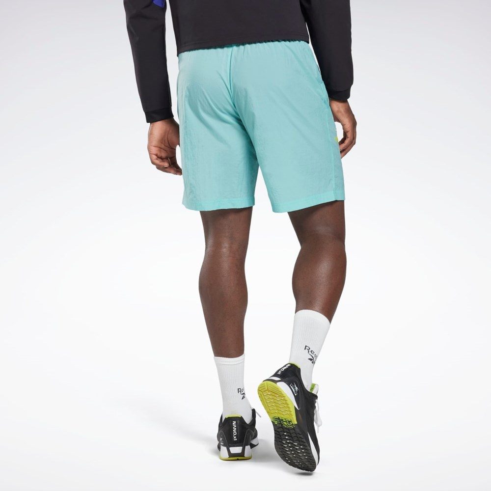 Semi Classic Teal Reebok Les Mills® Lightweight Woven Shorts | HN6062